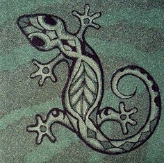 a drawing of a lizard on the ground