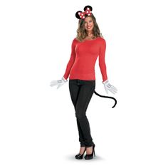 a woman in minnie mouse costume standing with her hands on her hips and wearing white gloves