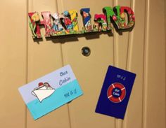 the door is decorated with magnets to spell out what's in the mailbox