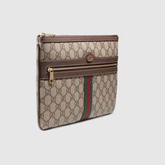 Description First used in the 1970s, the GG logo was an evolution of the original Gucci rhombi design from the 1930s, and from then it’s been an established symbol of Gucci’s heritage. The pouch combines the signature motif with the Web stripe—a timeless pairing that pays homage to Gucci’s roots. Size: 11.5″W x 7.5″H / 29cm x 19cm 100% genuine materials, matching the quality of the Gucci product (imported from Europe); Beige/ebony GG Supreme canvas, a material with low environmental impact, with brown leather trim Green and red Web Gold-toned hardware Oval enamel detail with metal Double G Microfiber lining with a suede-like finish Front zipper pocket Zipper closure Comes with dust bag, ation cards, and pamphlets 1:1 mirror image qualityDelivery 5-8 or 10-15 working days Please note that d Luxury Travel Accessories, Gucci Travel, Leather Travel Accessories, Rhombus Design, Gg Logo, Travel Bags For Women, The 1970s, Gucci Handbags, Small Accessories