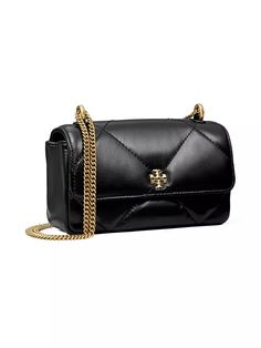 Tory Burch's Kira mini flap bag is a testament to the brand's commitment to quality and style. Crafted from 100% cow leather, this diamond quilted bag is a compact yet chic accessory perfect for everyday use..100% cow leather.Imported.SIZE.About 6.89'L x 3.94'H x 1.77'D.Tory Burch's Kira mini flap bag is a testament to the brand's commitment to quality and style. Crafted from 100% cow leather, this diamond quilted bag is a compact yet chic accessory perfect for everyday use.100% cow leatherImpor Leather Bag With Diamond Quilting In Rectangular Shape, Rectangular Leather Bag With Diamond Quilting, Leather Bags With Diamond Quilting, Pretty Handbags, Tory Burch Kira, Girly Bags, Tory Burch Bags, Tory Burch Bag, Chic Accessories