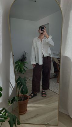 White button up, brown pants, birkenstocks, simple outfit, neutral outfit Lazy Outfit, Neutral Style, Fall 24, Lazy Outfits, Simple Outfit, White Button Up, Brown Pants, Neutral Fashion