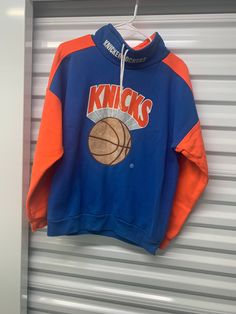 Vintage 80's New York Knicks Pullover Sweater Men's Large Retro Sweatshirt For Fall Sports Events, Retro Sweatshirt For Sports Events In Fall, Vintage Sweatshirt For Sports Events In Fall, Retro Long Sleeve Sweatshirt For Sports Events, Retro Winter Sweatshirt For Sports Events, Retro Fall Hoodie For Sports, Retro Winter Sports Tops, Retro Sweatshirt With Ribbed Cuffs For Sports Season, Retro Sports Hoodie For Winter