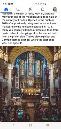 an image of the inside of a church with people sitting at tables in front of it