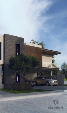 two cars parked in front of a modern house