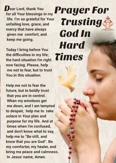 a woman is praying with her hands clasped to her face and the words prayer for trusting god in hard times