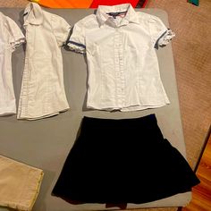 3 White Dress Shirts From French Toast And Chaps. 1 Long Blue Navy And White Shirt. 1 Blue Gap Kids Skirt. 1 Old Navy Khaki Capris. 1 Brand New Pair Of Cat And Jack Pants Cotton School Uniform Sets, White Short Sleeve School Sets, Blue Short Sleeve Top For School Events, White School Uniform Sets, Blue Short Sleeve Shirt For School Events, White Short Sleeve School Uniform Top, Casual Blue Tops For School Events, Girls School Clothes, White Dress Shirts