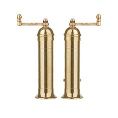 two brass faucets are standing side by side, one is turned upside down