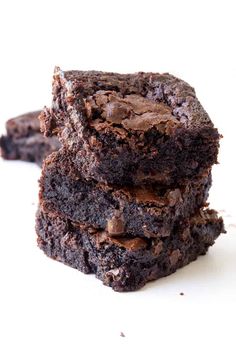 three chocolate brownies stacked on top of each other