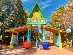 an entrance to sesame place at the park