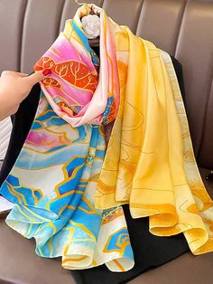 Elevate your accessory game with our luxurious, generously sized Oriental Landscape Printed Vegan Silk Scarf. Vegan silk is a cruelty-free alternative to traditional silk. Embrace luxury with a clear conscience. - 100% Polyester Satin - 33 x 70 inches - Imported Luxury Printed Silk Scarf For Spring, Luxury Yellow Scarf For Summer, Luxury Yellow Silk Scarf For Summer, Luxury Satin Scarves For Summer, Luxury Yellow Silk Scarf, Spain Fashion, Long Silk Scarf, Silk Bandana, Stole Scarf