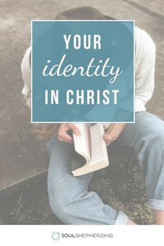 a person sitting on the ground reading a book with text overlay that reads, your identity in christ