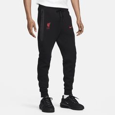 Wonderfully warm for its weight, these Tech Fleece joggers are perfect for staying warm and repping your team at the same time. Our premium, lightweight fleece—smooth both inside and out—gives you plenty of warmth. Athleisure Activewear With Team Logo For Sports, Nike Joggers For Winter Sports, Black Fleece Sports Joggers, Nike Winter Joggers For Sports, Nike Winter Sports Joggers, Winter Nike Joggers For Sports, Black Fleece Joggers For Sports, Black Fleece Sports Bottoms, Nike Moisture-wicking Sweatpants For Sports