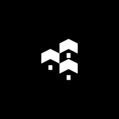 an abstract black and white logo with geometric shapes in the middle, on a dark background