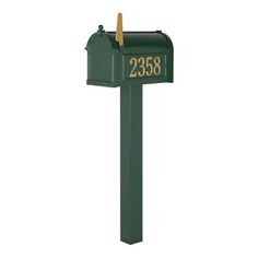 a green mailbox with the number 2238 on it's front and side