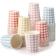 many different colored paper cups stacked on top of each other