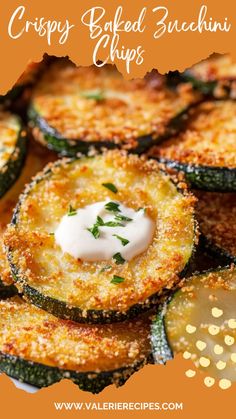 crispy baked zucchini chips with sour cream on top and sprinkled with parsley