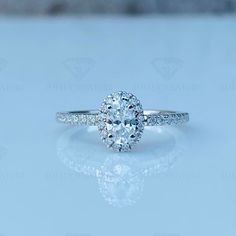 ✦To make your decision easier we offer:✦ -USA Free Shipping -Free Engraving -Rush Order -Handmade Custom Design -Free Jewellery Box -100% secure Online Shopping. -Flexible Payment Plans  Material: Sterling Silver/Argentium Silver/White Gold/935 Argentium Silver/White Gold FINEST SIMULANTS DIAMONDS Center Stone Shape: Oval Cut (6X4MM) Center Stone Color: White Center stone weight: 1 Ct Approximately ALL ITEMS are made to order and can be ordered for more quantities. It will take approx. 5-7 Working Day to ship Product. Express Shipping takes 5-10 Days to deliver via Aramex/UPS/FedEx/DHL. USA Free Shipping Takes 7-10 days Via USPS. Thank you for visiting my shop. **Happy Shopping** Oval Cut Ring, Engagement Ring White Gold, Ring White Gold, Argentium Silver, Ring Oval, White Gold Ring, Ring Engagement, Halo Ring, Moissanite Ring