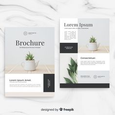 two brochures with plants on them, one is white and the other is black