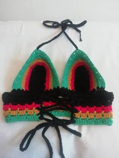 Rasta Colours red gold and green  handmade Crochet Crop Top Gift for her Crochet Bralette Gift for Girlfriend Crochet Top Festival top Rasta Crochet Top Summer Top Crop Top This pretty handmade rainbow colour crochet top is  pretty and adorable will be great for the summer, ideal  beachwear top or for night out on the town, represent Jamaica colours handmade with 100% cotton Follow this link for more crochet bralette listings https://www.etsy.com/uk/shop/Rosevershetlvt Size: 8-10 UK (Small)         36-38 EU (Small)           4-6 US   (Small)          12-14 UK (Medium)         40-42 EU (Medium)            8-10 US (Medium) Customer order welcome DM me if you can't find your size Care instructions. Machine washable, we recommend hand wash for your bralette to last longer Please check  the siz Adjustable Crochet Top For Festival, Hippie Green Crochet Top, Handmade Yarn Crochet Top For Festivals, Handmade Multicolor Crochet Top For Festival, Handmade Multicolor Hippie Crochet Top, Multicolor Hand Knitted Crochet Top For Festivals, Handmade Green Crochet Top For Festival, Bohemian Green Crochet Crop Top, Hippie Multicolor Crochet Crop Top