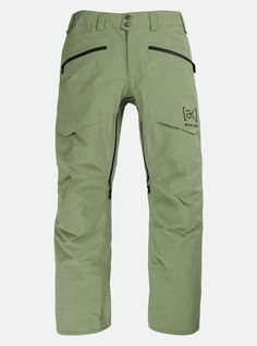 a pair of green ski pants with zippers on the bottom and side pockets, in front of a white background