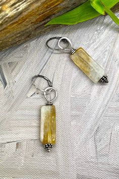 Rectangle citrine stones with a small sterling silver accents on sterling silver leverbacks. Length: 2" Handmade Yellow Rectangular Jewelry, Yellow Rectangular Citrine Jewelry, Rectangular Citrine Jewelry, Citrine Stone, Beaded Jewelry Diy, Free Gift Wrapping, Silver Accents, Citrine, Jewelry Shop