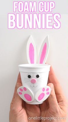 a hand holding up a cup with bunny ears on it and the words foam cup bunnies