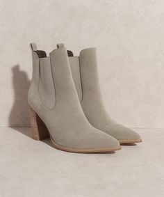 Simply elevated with a stacked heel and a pointed toe shape Upper Material: Beige Insole Material: Padded Insole Sole or Heel Material: Leather wrap heel Shaft Height: 4.5" Heel Height: 3.5" The front platform:0.25" Circumference of shoe opening: 10" Bottom of the sole: 4.5" Chelsea Boots Heel, Heeled Chelsea Boots, Grey Heels, Wrap Heels, Chelsea Ankle Boots, Gray Suede, Chelsea Boot, Short Boots, Leather Wraps