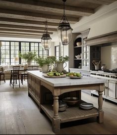 a large kitchen with an island in the middle