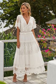 The Luminous Dawn Lace Gown is the perfect choice for any special occasion. This stunning gown is made from a luxurious blend of 95% polyester and 5% spandex, giving it a soft and comfortable feel. The intricate lace detailing adds a touch of elegance and sophistication to the gown, while the fitted silhouette flatters your figure. The delicate lace trim along the neckline and hemline adds a romantic touch, making this gown a timeless classic. The Luminous Dawn Lace Gown is sure to make y... Boho Lace Maxi Dress, Chic Maxi Dresses, Dress Women Elegant, Maxi Dress Online, Maxi Robes, Patchwork Dress, Vestido Casual, Boho Maxi Dress, Lace Gown