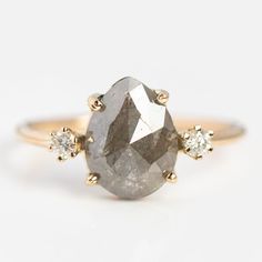 Eternal Grey Diamond Ring | Local Eclectic Teardrop Rose Cut Diamond Proposal Ring, Proposal Pear-shaped Rose Cut Diamond Ring, Timeless Rose Cut Diamond Ring For Proposal, Timeless Rose Cut Diamond Proposal Ring, Timeless Diamond Ring With Rose Cut For Proposal, Gray Diamond Wedding Jewelry, Love Is Eternal, Grey Diamond Ring, Engagement And Wedding Rings