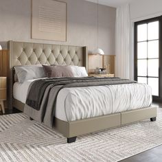 a bedroom with a large bed and two nightstands