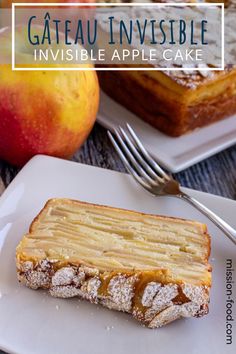 an apple cake with powdered sugar on top is sitting on a plate next to some apples