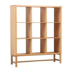 a wooden bookcase with four shelves on each side