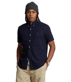 Complete your business casual look with the Polo Ralph Lauren® Garment-Dyed Oxford Shirt..Slim fit shirt has a button-down construction, complete with collar buttons..Shirttail hemline..Signature Pony Player is embroidered on the left chest..100% cotton..Machine wash, tumble dry..Imported..Product measurements were taken using size MD. Please note that measurements may vary by size..Measurements: Length: 30 in Casual Slim Fit Button-up Shirt, Fitted Shirt With Polo Collar And Placket, Casual Fitted Shirt With Spread Collar, Ralph Lauren Casual Shirt For Business Casual, Casual Semi-formal Shirt With Placket, Casual Semi-formal Shirt, Fitted Casual Polo Collar Shirt, Fitted Casual Shirt With Polo Collar, Casual Slim Fit Polo Collar Shirt