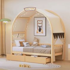 a child's bedroom with an arch bed and storage drawers under the bedspread