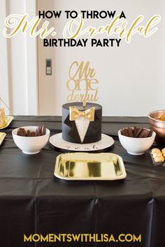 a black and gold themed birthday party with cake, cupcakes, and candy