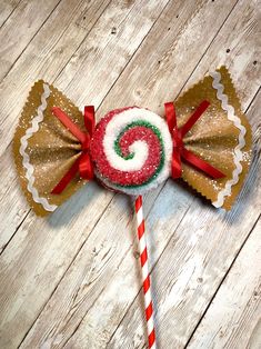 a candy lollipop on top of a wooden table