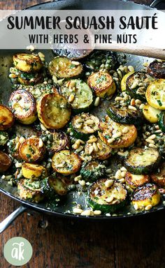 a skillet filled with roasted vegetables and nuts