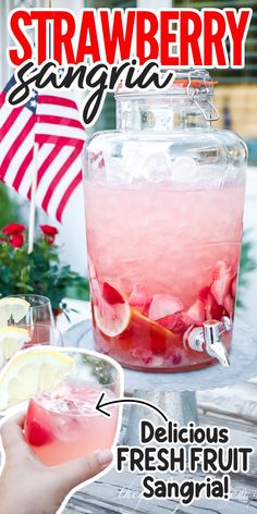 a person holding a drink in front of a large jar filled with ice and fruit