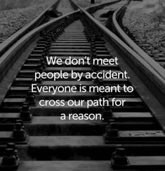 a train track with the words we don't meet people by accident everyone is meant to cross out path for a reason