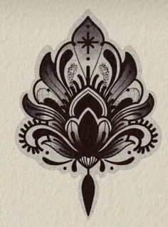 an ornate design is shown in black and white on a piece of paper with a cross