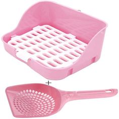 two pink plastic utensils with holes in the middle and one is holding a spatula