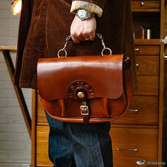 OrcaJump - Timeless Vintage Messenger Bag: A Distinctive and Classic Style Cognac Saddle Shoulder Bag For Daily Use, Saddle Satchel With Detachable Strap, Everyday Saddle Satchel With Removable Pouch, Everyday Saddle Satchel With Detachable Strap, Leather-handled Saddle Satchel For Daily Use, Saddle Bag With Removable Pouch For Daily Use, Daily Use Saddle Bag With Removable Pouch, Everyday Saddle Bags, Cognac Saddle Shaped Satchel For Daily Use