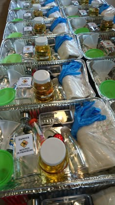 several trays filled with different types of condiments