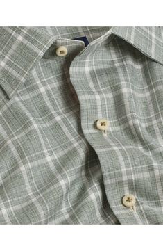 Crisp cotton poplin offers serious comfort in a casual long-sleeve button-down shirt covered in a plaid pattern. Front button closure Spread collar Long sleeves with adjustable button cuffs 100% cotton Machine wash, line dry Imported Plaid Spread Collar Shirt For Business Casual, Business Casual Plaid Shirt With Spread Collar, Plaid Top With Button Closure For Business Casual, Plaid Tops With Casual Collar And Button Closure, Casual Long Sleeve Dress Shirt With Button Closure, Classic Plaid Shirt With Spread Collar, Classic Plaid Shirt With Buttons, Plaid Shirt With Spread Collar And Placket, Plaid Button-up Shirt For Business Casual