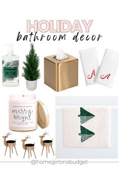 holiday bathroom decor is featured in this postcard style photo with gold accents and white towels