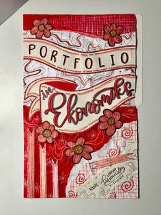 a piece of paper with the words port folio in red and white on it