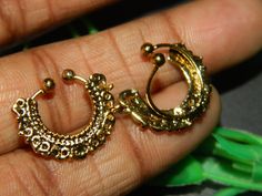 You will receive 1 piece of very beautiful Indian Nose ring, Fake Septum Nose ring 1:Diameter: 13mm Approx. Material: Brass Materials: Surgical steel Gold Belly Ring As A Gift, Round Septum Ring Gift, Traditional Hypoallergenic Jewelry, Gold Hypoallergenic Toe Rings For Wedding, Hypoallergenic Gold Toe Rings For Wedding, Gold Small Hoop Belly Rings As Gift, Gold Hypoallergenic Round Body Jewelry, Dainty Pierced Round Nose Rings, Gold Pierced Toe Ring