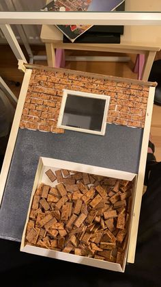 a box filled with wine corks sitting on top of a table next to a mirror